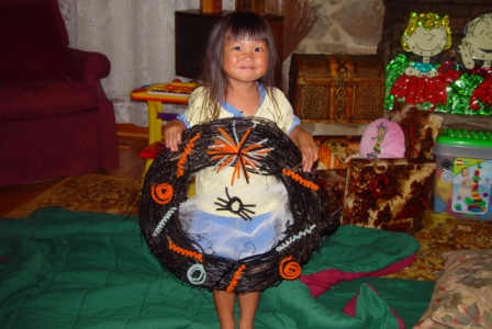 Kasen with her Halloween wreath